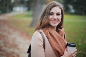 a girl waring a heated scarf